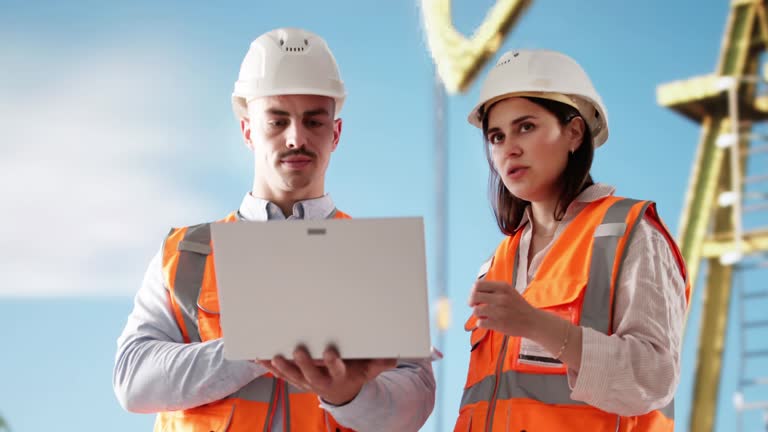 Happy operators reviewing process dashboards